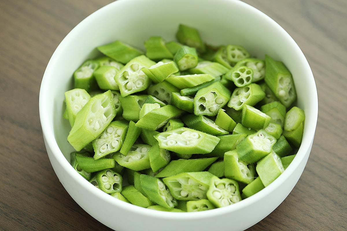 Sliced lady's finger vegetable in a white plate. 