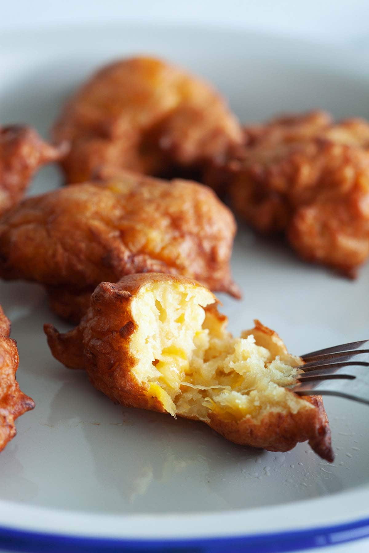 Malaysian kuih kodok or fried banana fritters.