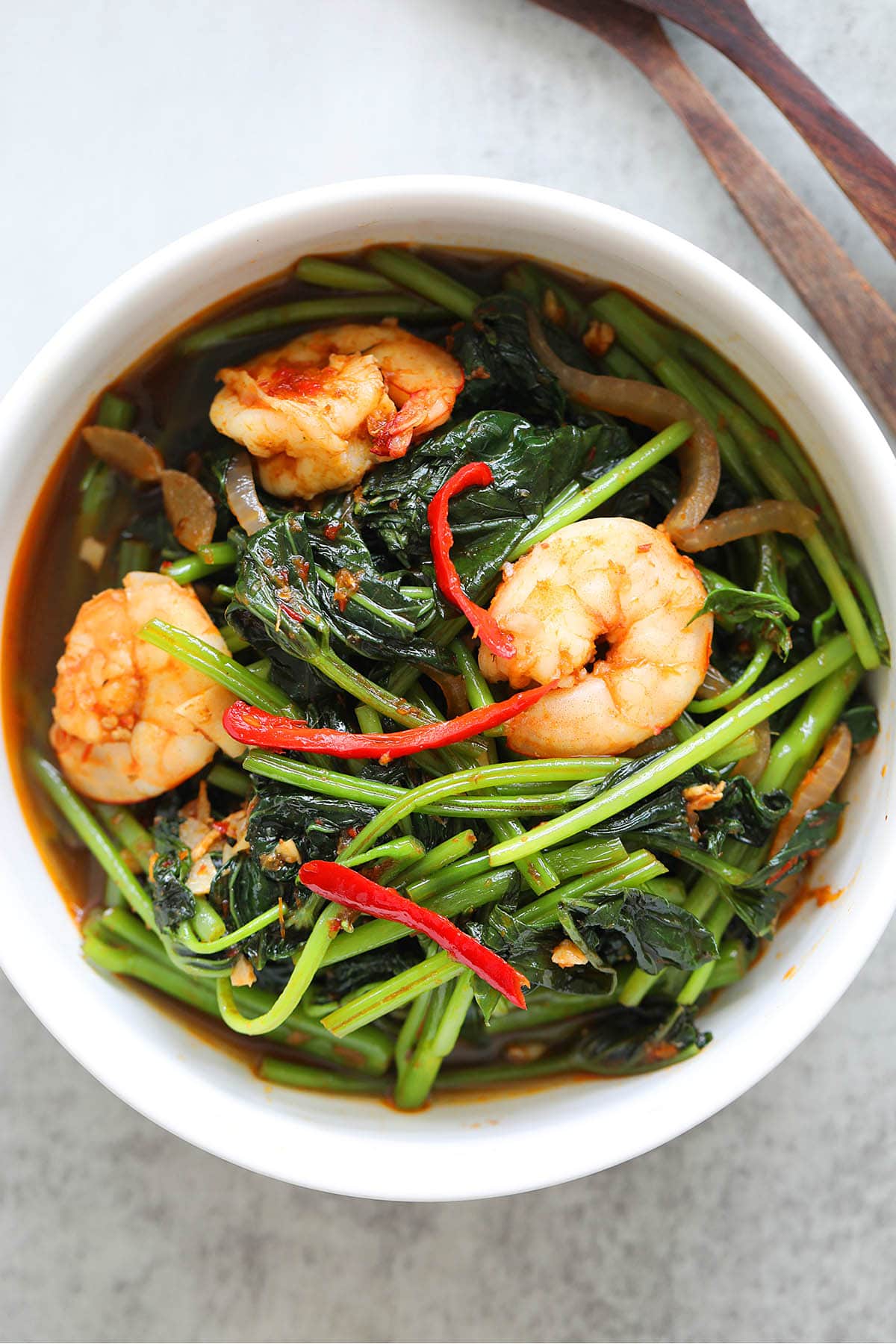 Sweet potato leaves recipe with shrimp and sambal sauce. 