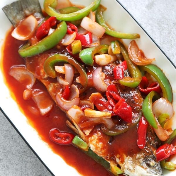 Sweet and sour fish served on a plate.