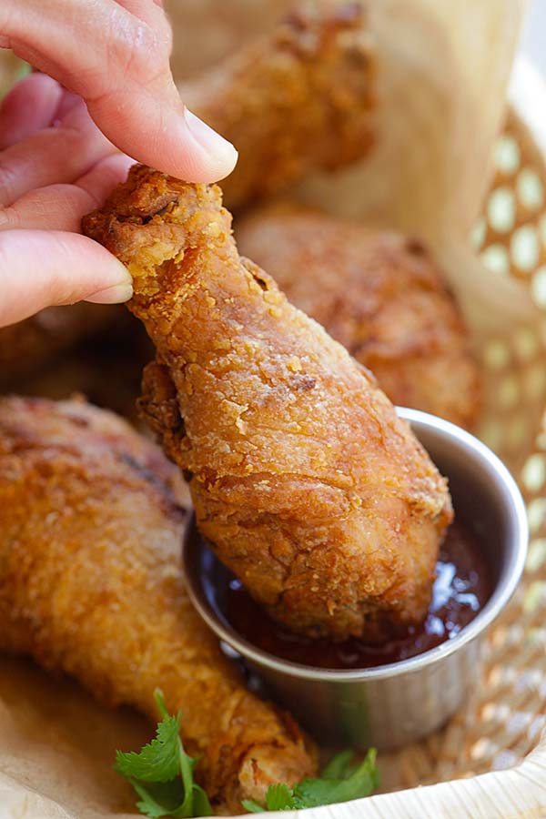 Best Thai fried chicken marinate with cilantro, garlic and Asian seasonings dipped into Thai sweet chili dipping sauce.