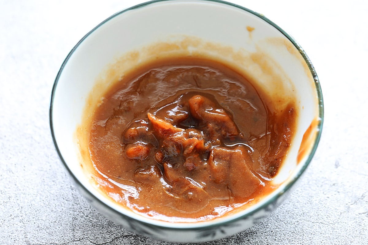 Tamarind juice in a bowl.