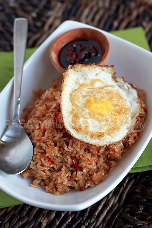 Nasi goreng/fried rice is a popular dish in Southeast Asia. This recipe is an Indonesian version of fried rice served with fried egg. | www.666630.xyz