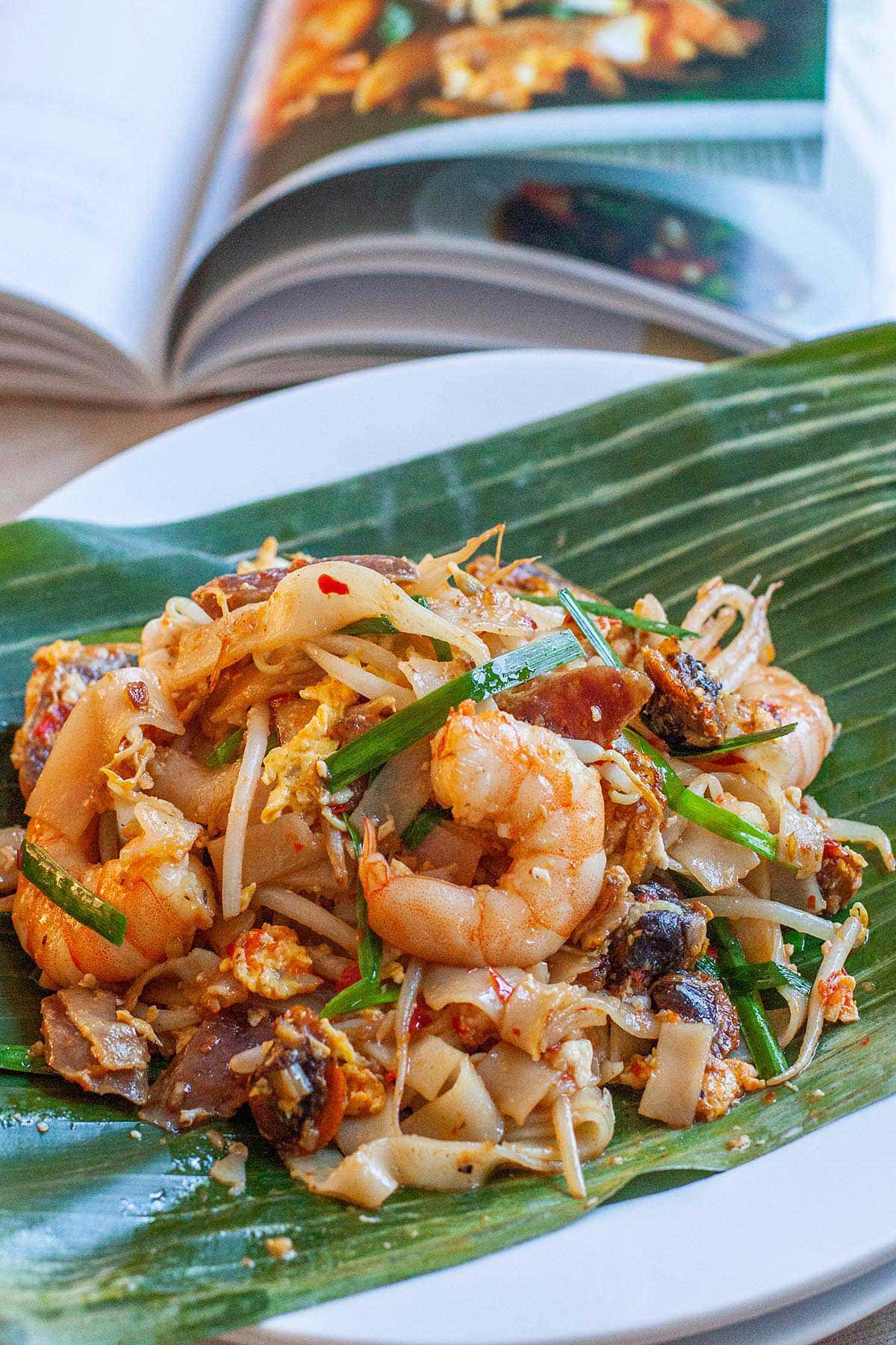 Authentic Penang Char Kuey Teow with step-by-step recipe guide. Char Kuey Teow is a famous Penang hawker food. The best Char Kuey Teow recipe on the web. | www.666630.xyz