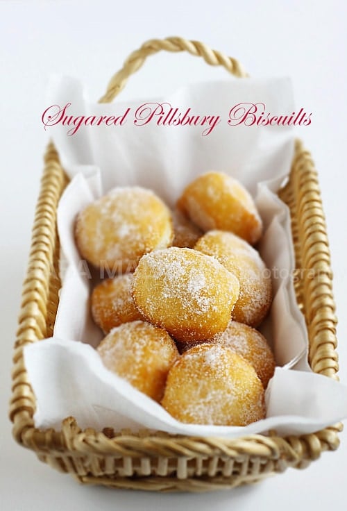 Cheater Donuts using Pillsbury biscuits. Fluffy, light, pillowy and oh-so-YUM. These sugared Pillsbury biscuits are the BEST! | www.666630.xyz