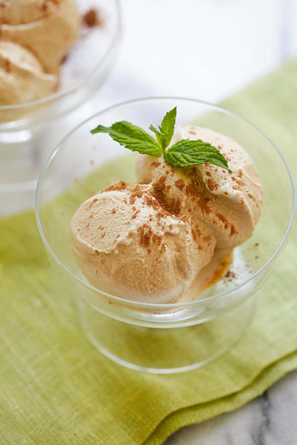 2 scoops of coffee flavored ice cream served in a dessert cup, ready to serve.