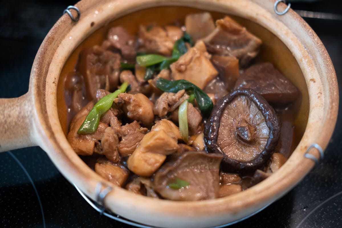 Chicken mushroom stew in a clay pot. 