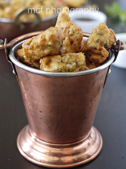 Easy homemade vegetable pakora served in a mini bucket.