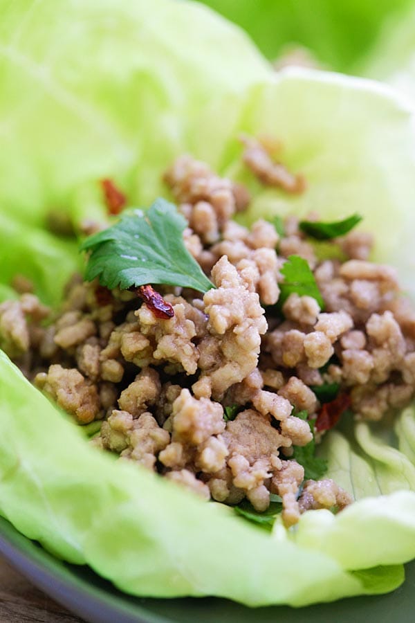 Healthy Asian minced pork recipe wrapped in lettuce leaves ready to serve.