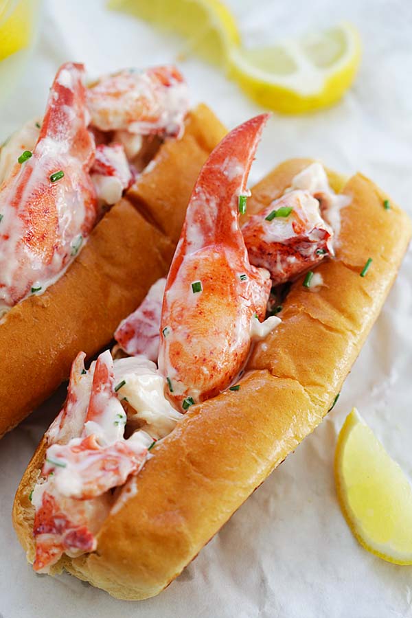 Easy New England lobster salad rolls served on baking sheet.