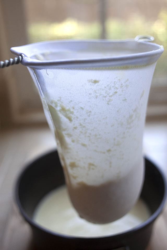 Filtering soy milk.