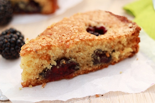 Healthy moist buttermilk cake with blackberries, ready to serve.