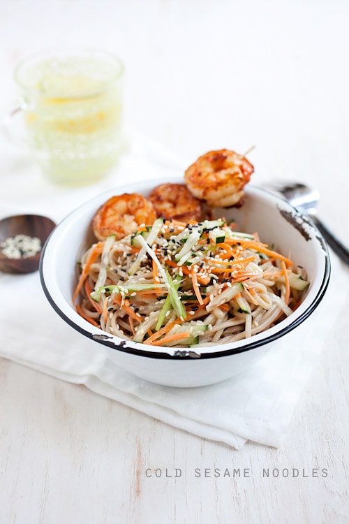 Easy and quick cold sesame noodles with shrimp served in a bowl.