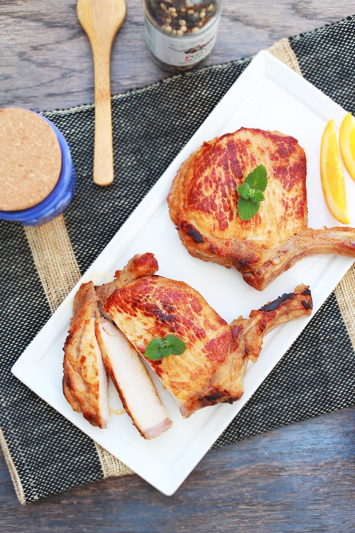 Easy homemade skillet brined pork chops on a plate.