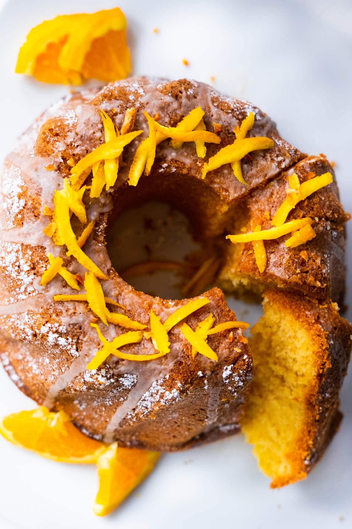 Sicilian whole orange cake topped with orange peel. 