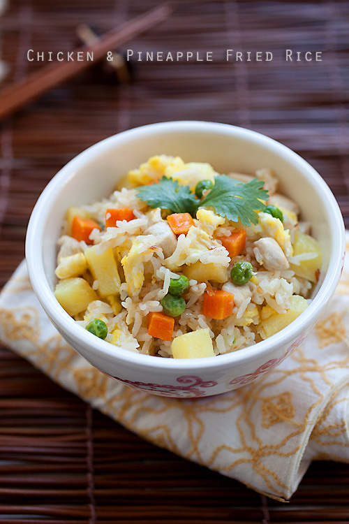 Easy and delicious Asian chicken and pineapple fried rice recipe served in a bowl.