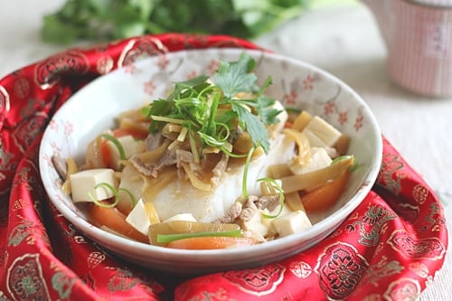 Easy and healthy Malaysian Teochew steamed fish serve in a plate.