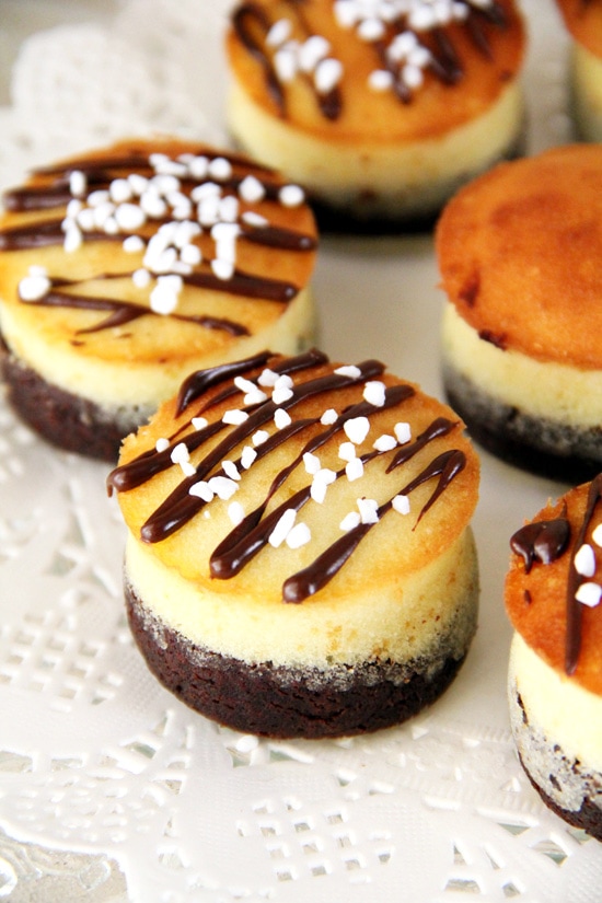 Homemade easy brownie butter cupcakes with chocolate sauce and sprinkles.