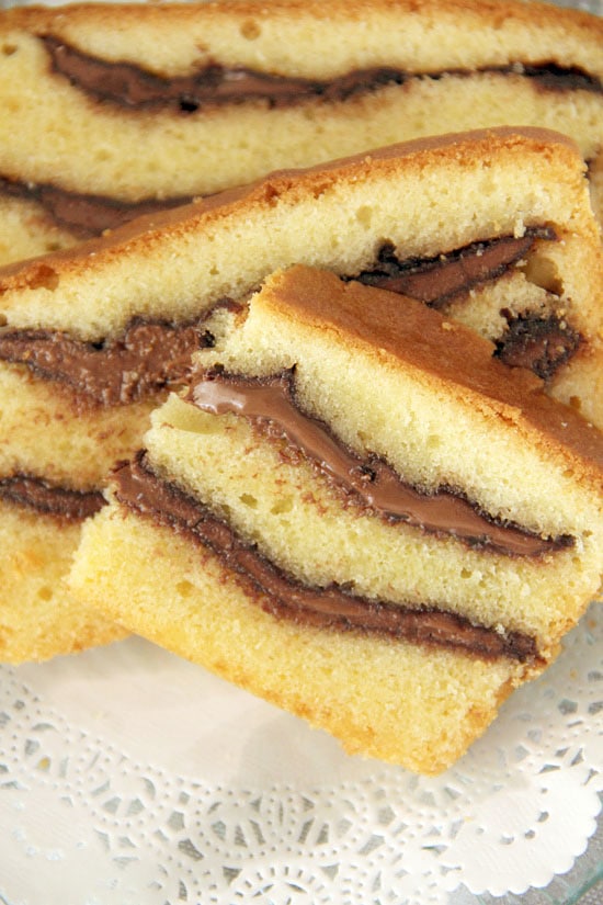 Easy recipe for thick, gooey Nutella swirls in rich buttery pound cake.