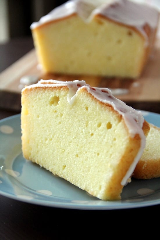 Easy sliced Meyer lemon pound cake glazed with lemony sugar served in a plate.