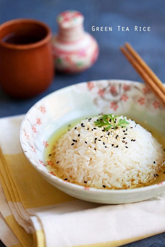 Green Tea Rice topped with sesame seeds, served in a bowl. 