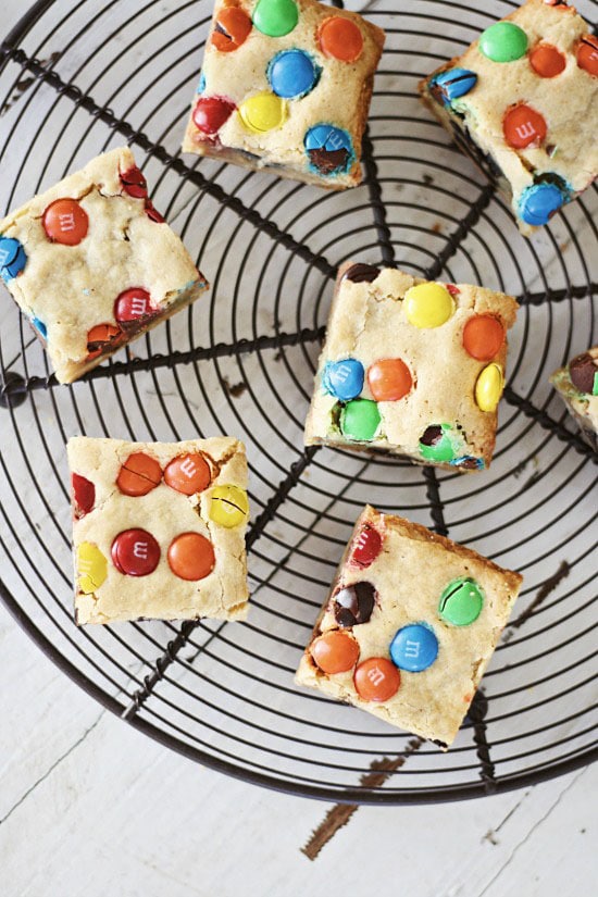 Easy homemade M&M's and Oreo Cookies Bars on cooling rack.