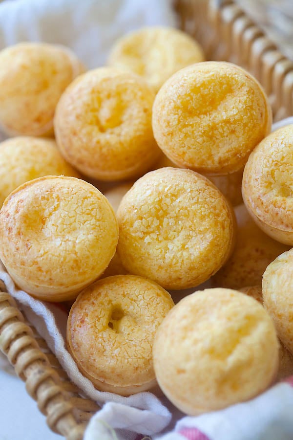 basket of freshly baked Brazilian cheese bread,or Pão de Queijo ready to serve.