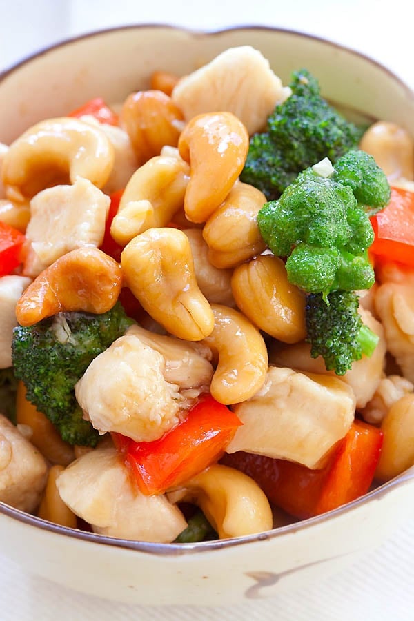 Healthy Asian stir fry honey chicken with cashew nuts in a bowl.