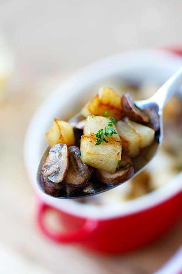 Butter Sauteed Potato and Mushroom on a spoon.