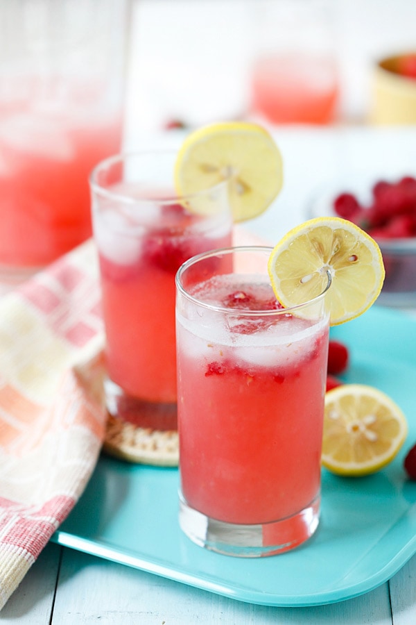 Sweet, refreshing and thirst-quenching lemonade with raspberry served in glasses.