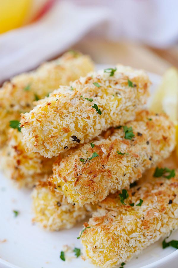 Baked Mozzarella Cheese Sticks with cheese strings ready to serve.