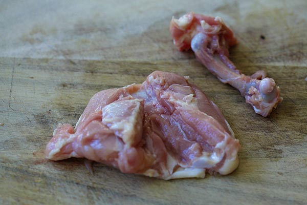 Learn the easy step-by-step to debone chicken thighs so you keep the skin on, but with no bones | www.666630.xyz