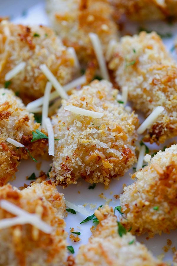 Close up crispy oven baked chicken nuggets ready to serve.