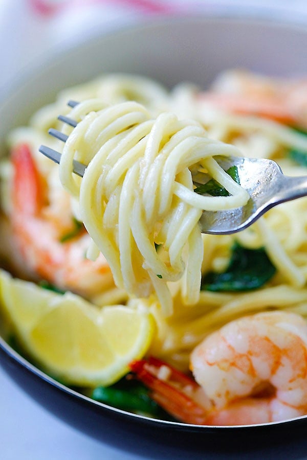 Healthy Italian shrimp and spinach spaghetti pasta in homemade easy garlic butter sauce.