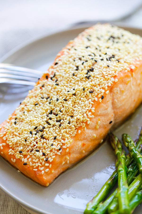 Close up of homemade healthy sesame coated salmon in a plate.