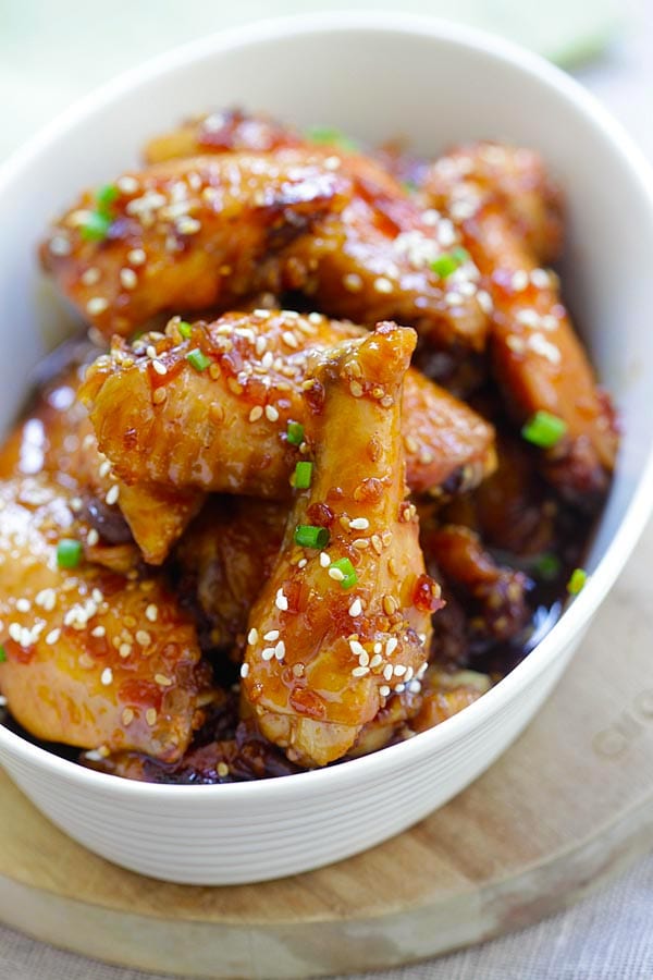 Easy and quick crock pot chicken wings with island teriyaki sauce serve in a bowl.