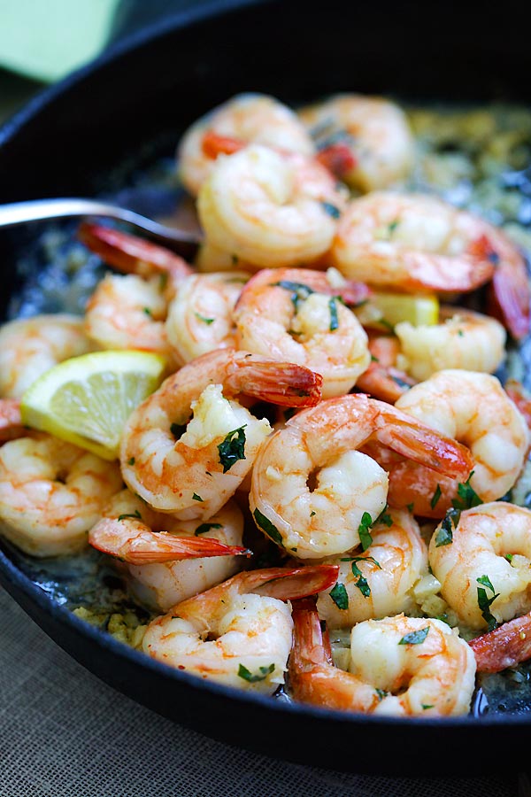 Shrimp scampi with sauteed shrimp in garlic lemon butter sauce.