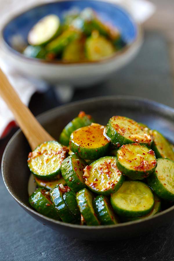 Easy and quick Asian cucumber salad mixed with a flavorful dressing ready for serving.