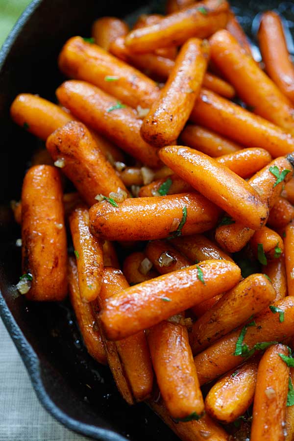 Healthy baby carrots with honey balsamic sauce ready to serve.