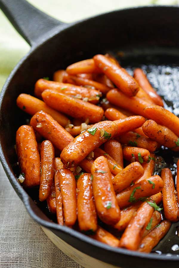 Honey balsamic carrots in a skillet.