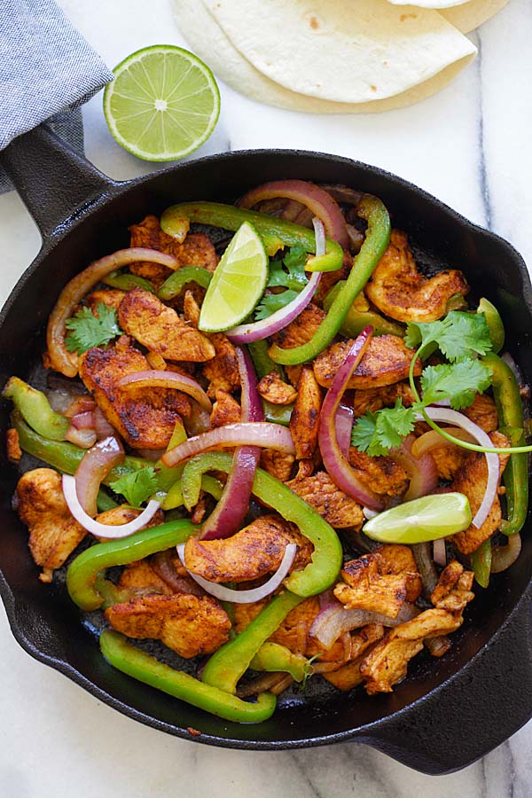 Mexican Chicken Fajita cooked in a sizzling cast-iron skillet.