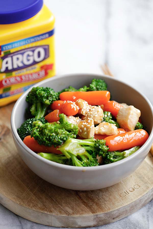 Stir fry sauce with chicken, baby carrots and broccoli, ready to serve.