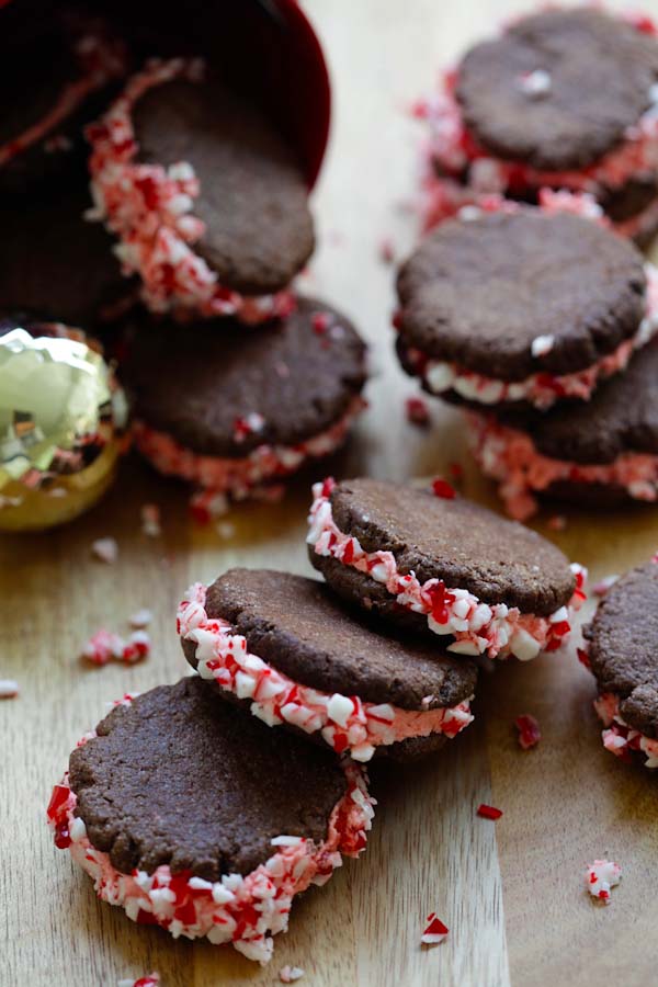 Easy and cute festive chocolate cookies with frosting and candy canes.