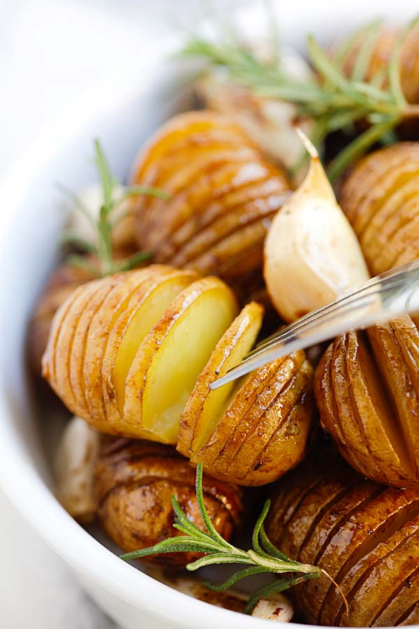 Easy garlic balsamic honey sauce roasted hasselback potatoes, ready to serve.