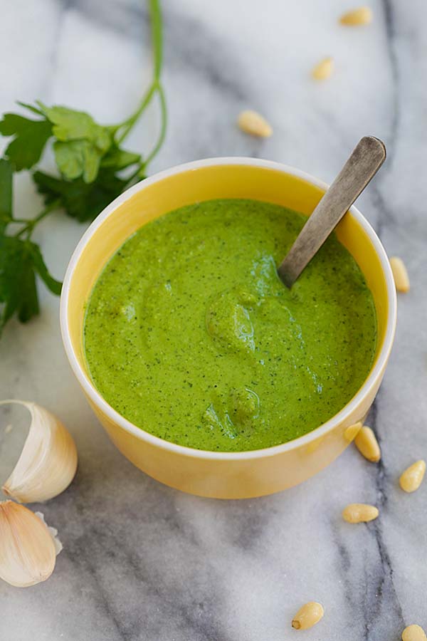 Easy and delicious garlic pesto sauce, in a bowl.