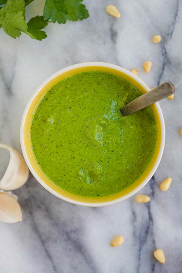 Easy and quick homemade pesto sauce made with garlic, Parmesan cheese, basil and pine nuts.