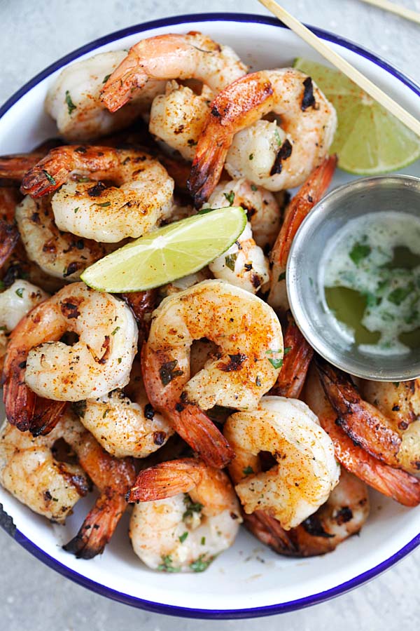 Top down view of garlic lime shrimp with garlic, butter and lime juice.