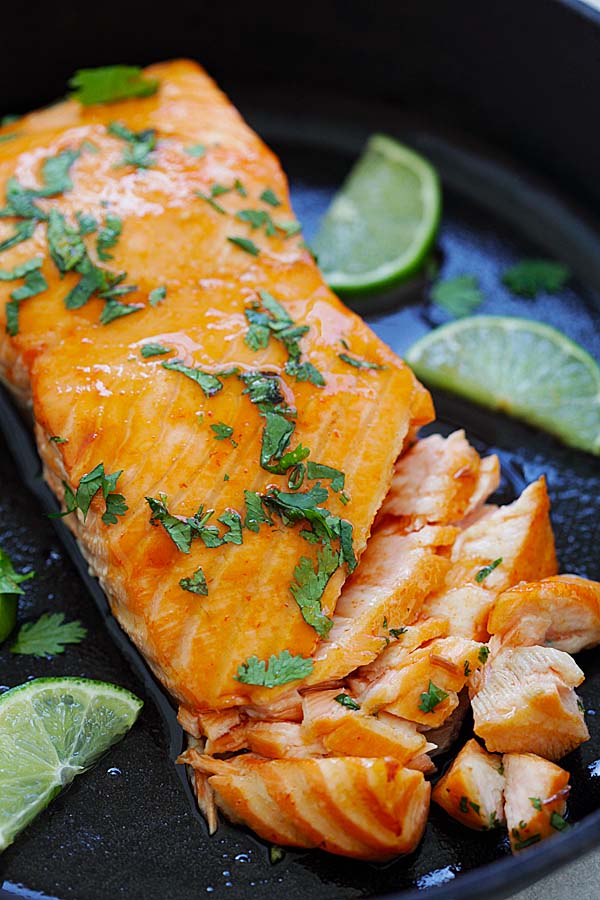 Easy and delicious flaky sriracha lime salmon baked and ready to serve.