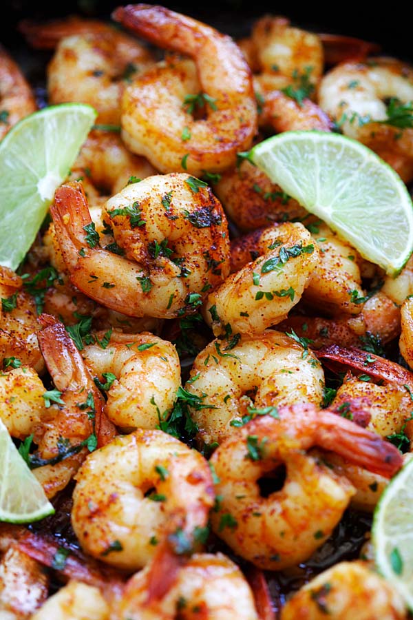 Close up homemade chipotle lime shrimp in a skillet.