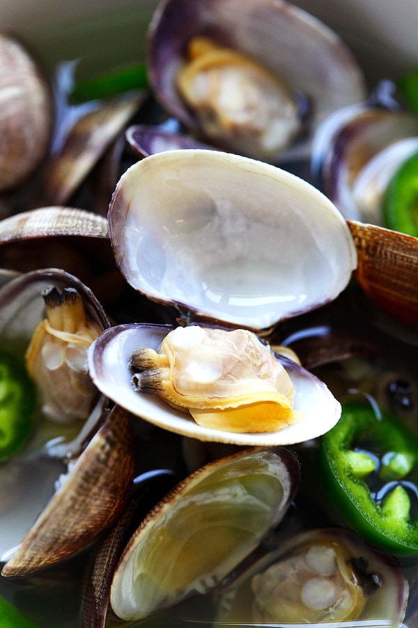 Easy and healthy homemade Korean clam soup cooked with jalapeno and garlic, ready to serve.